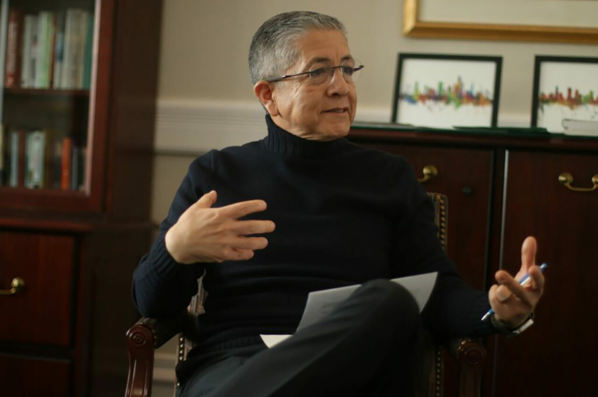 Salvador Aceves seated in an office