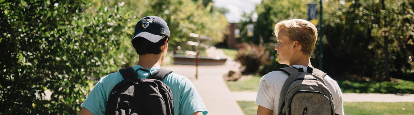 Two students walking to class 