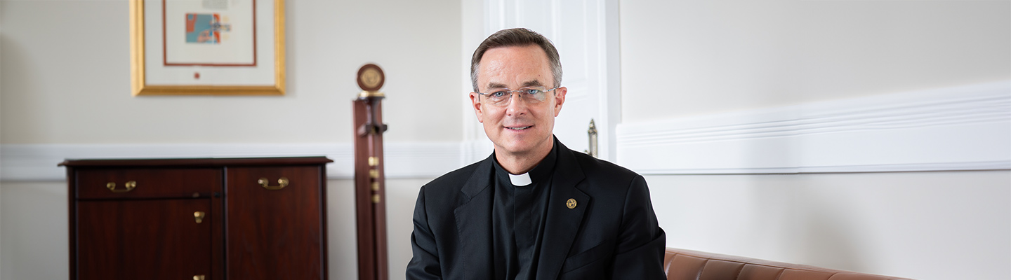 Rev. D. Scott Hendrickson, S.J., D.Phil. sits in the President's Office in Main Hall on the Regis campus