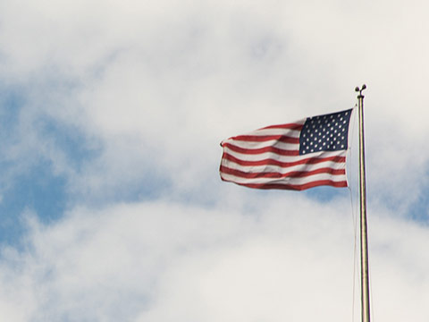 American flag waving in wind