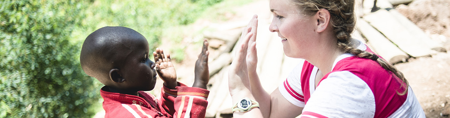 woman high fives small child
