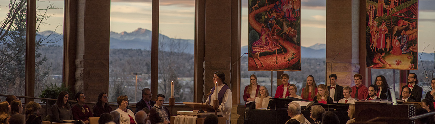 service in the chapel with mountains in the background