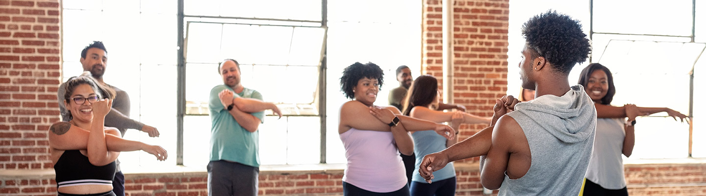 a Health and Exercise Science student leads a strength training class