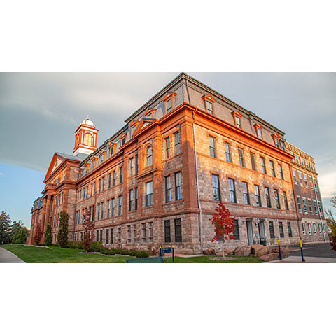 a view of main hall from the ground in the light of morning