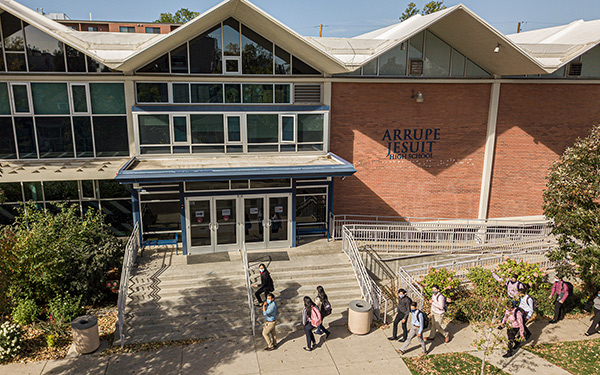 Arrupe Jesuit High School exterior shot with students