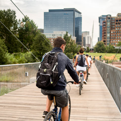 Students biking together through Denver.