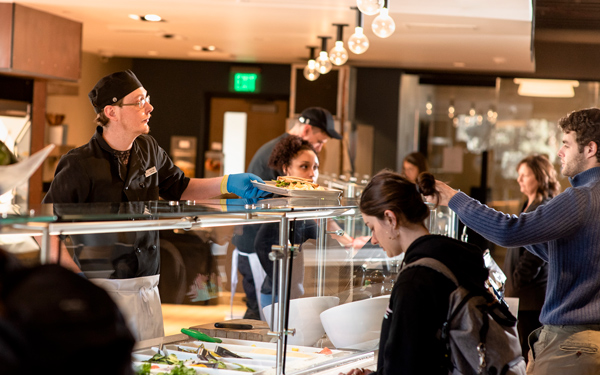 Students selecting a meal in campus dining