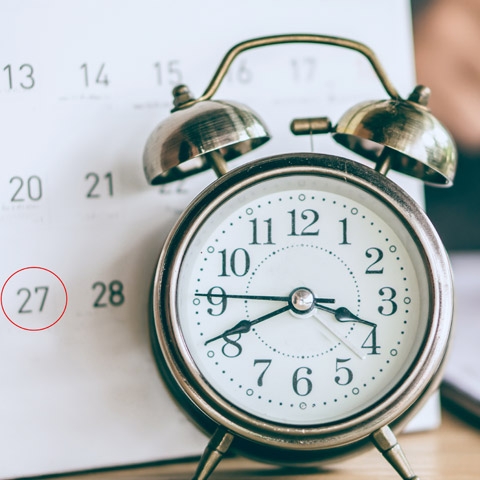 clock and calendar with date circled