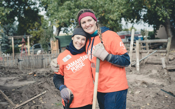 Students working together on a service-based project at the Romero House