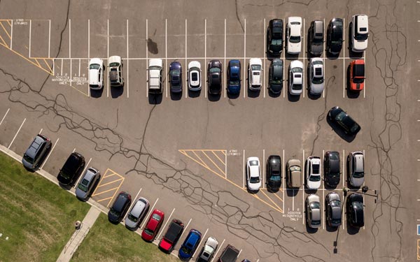 Aerial view of parking spots on Regis campus
