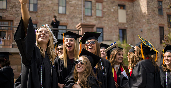 Grads take selfie at commencement