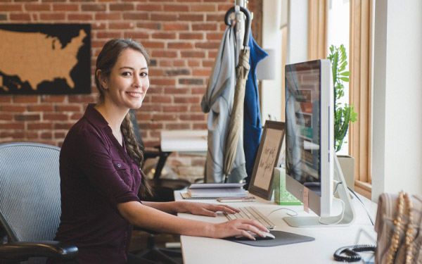 girl on computer at internship