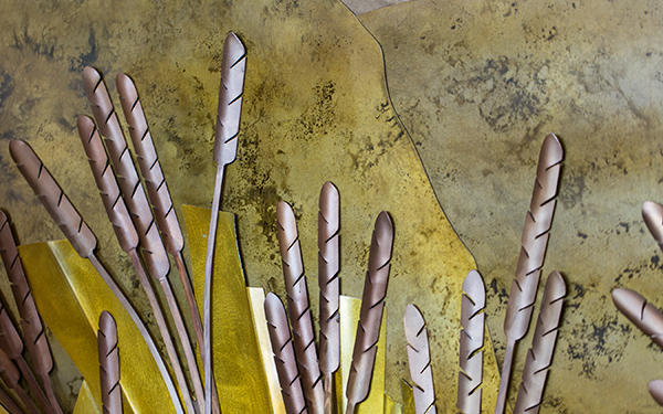cattails on a relief mural in the St. John Francis Regis Chapel on the Northwest Denver campus