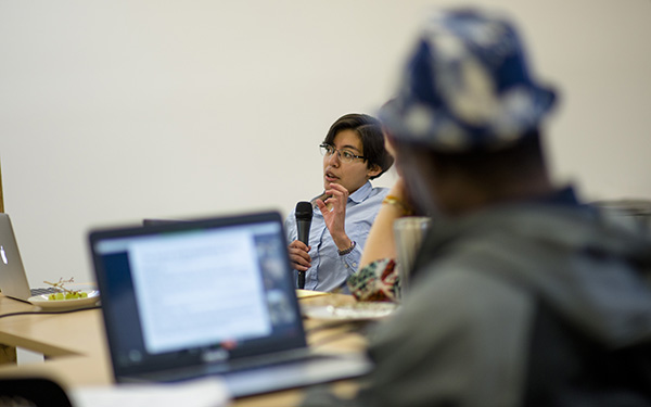 woman with microphone in classroom