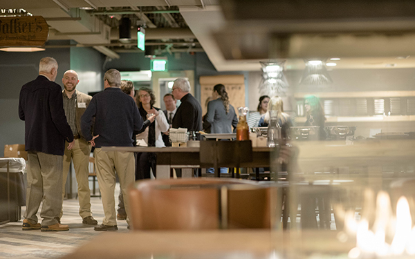 people gathering in walker's pub