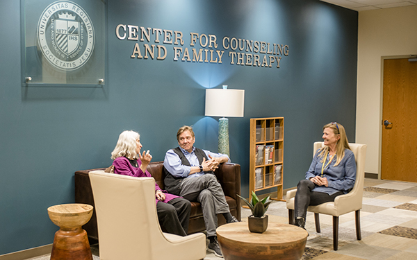 people sitting in counseling office
