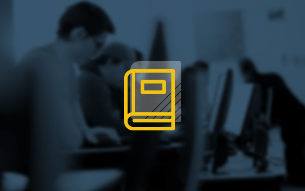 people working on computers with book icon above