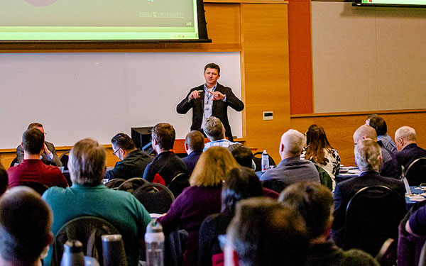 crowd attending the cybersummit event at Regis