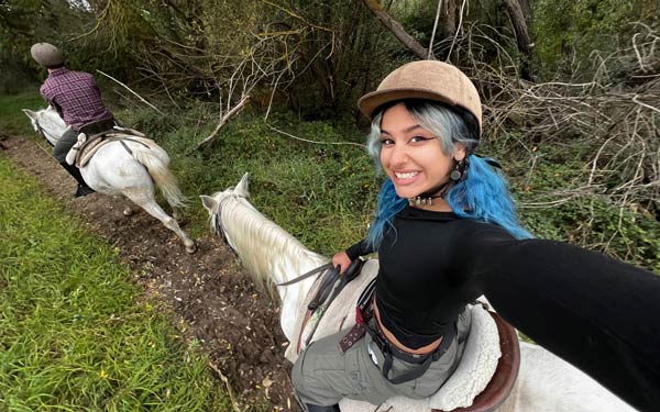 Erika Yevara riding horseback