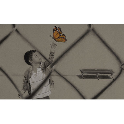 viewed from behind a chain link fence, a small boy reaches out to a floating butterfly