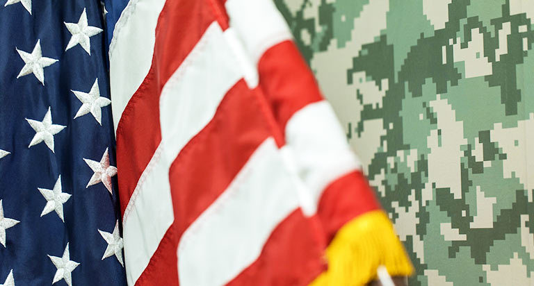 US flag and olive drab camouflage