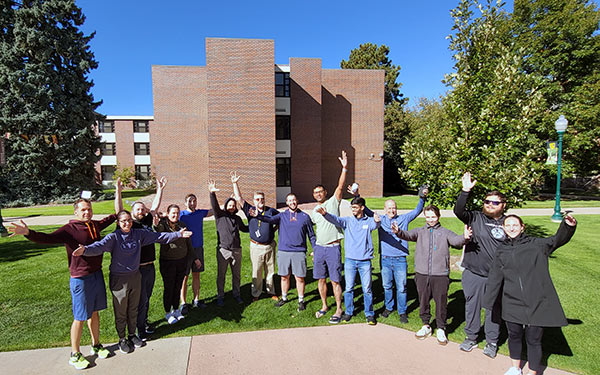 a cohort of Regis Manual Physical Therapy Fellowship Certificate students and faculty have fun on Boettcher Commons on the Denver, Colorado campus
