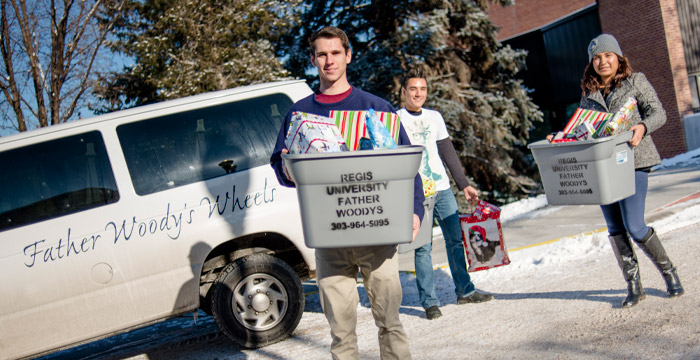 students carrying boxes