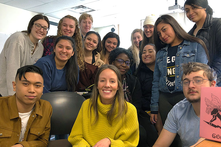 first-year students pose with their first-year faculty advisor