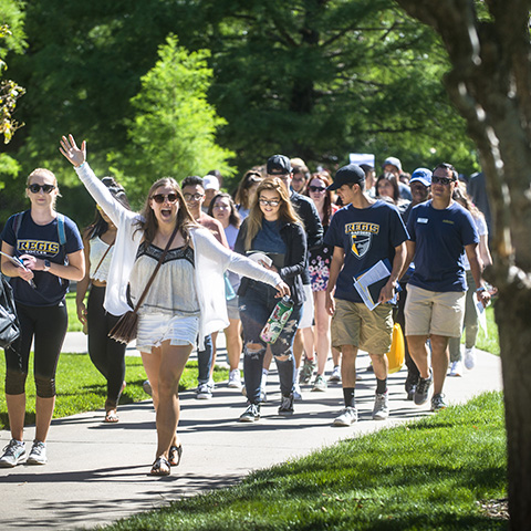 excited new students on campus