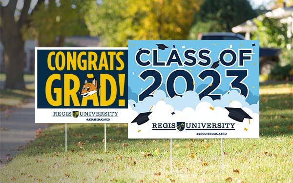 yard signs in grass read Congrats Grad and Congratulations class of 2023
