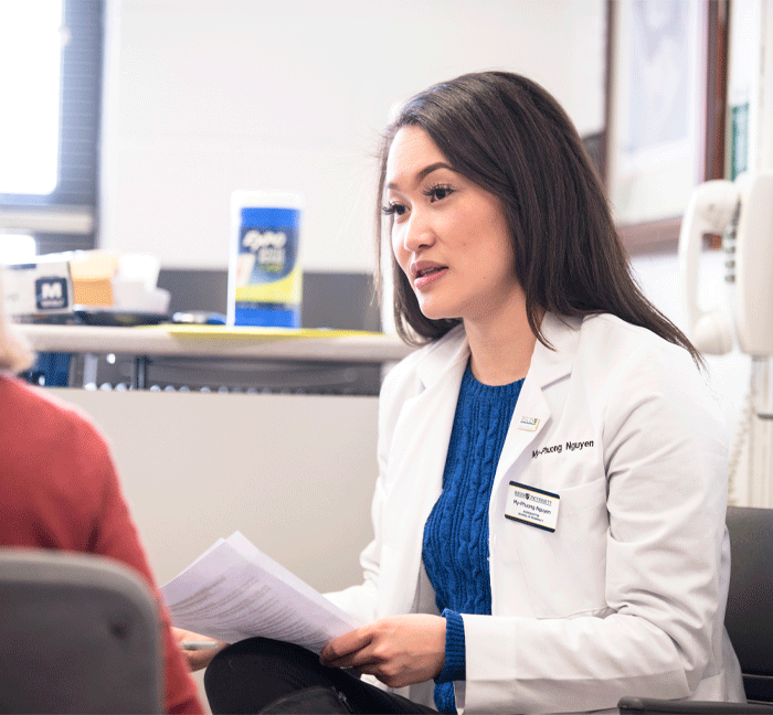 health professional speaking with patient