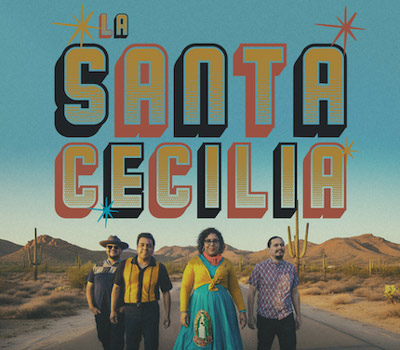 Retro poster reading “LA SANTA CECILIA” above four musicians posing on a desert road, with mountains, cacti, and colorful vintage typography