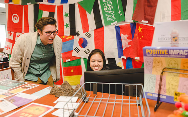 students meet with their international advisors in the Office of Global Engagement