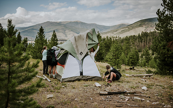 Team sets up tent