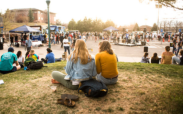 Two student overlooking Ranger Week festivities