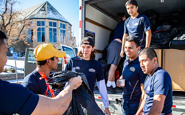 Students helping with service project