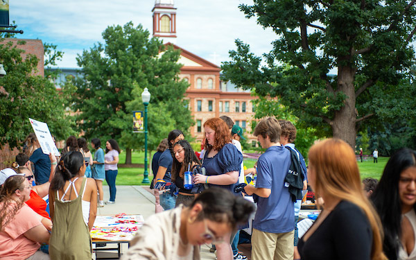 a crowd of students gathered on the Quad at the Resource Fair
