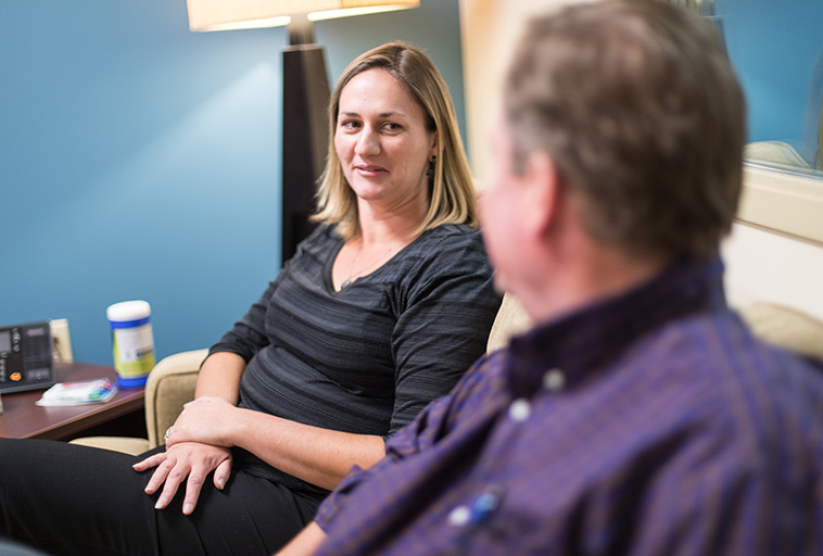 Couple in therapy looking at each other