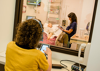 nurses being observed in lab