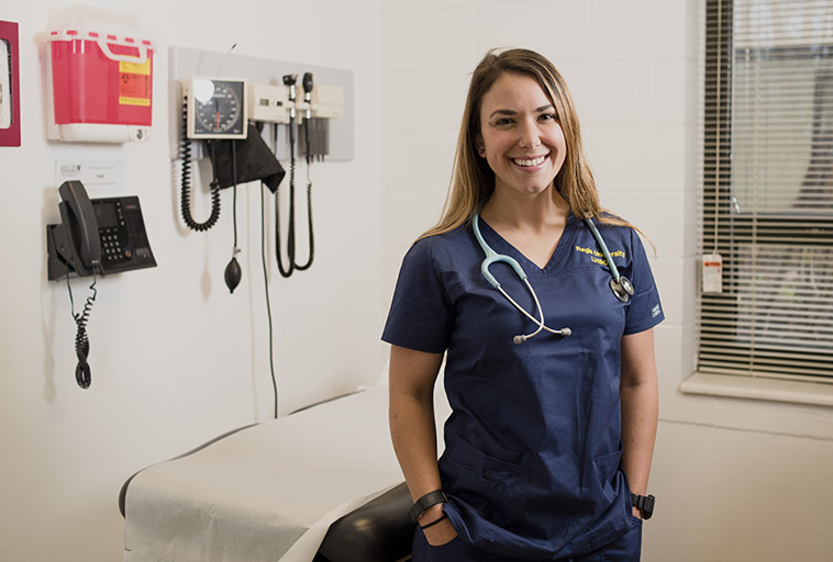 nurse smiling at the camera