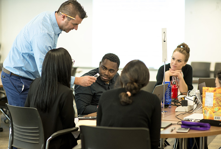 Pharmacy students learning collaboratively