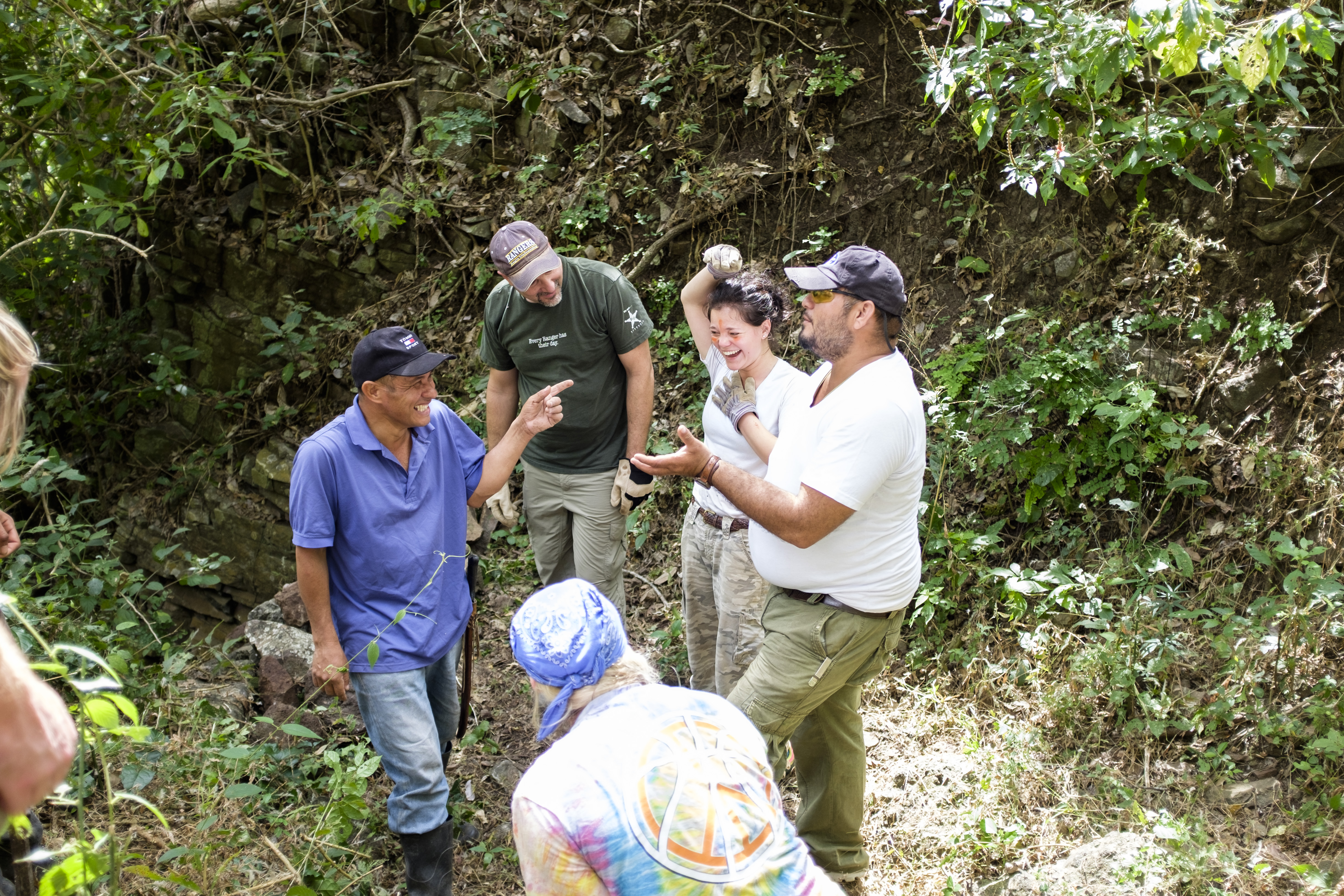 student in the field doing a service project