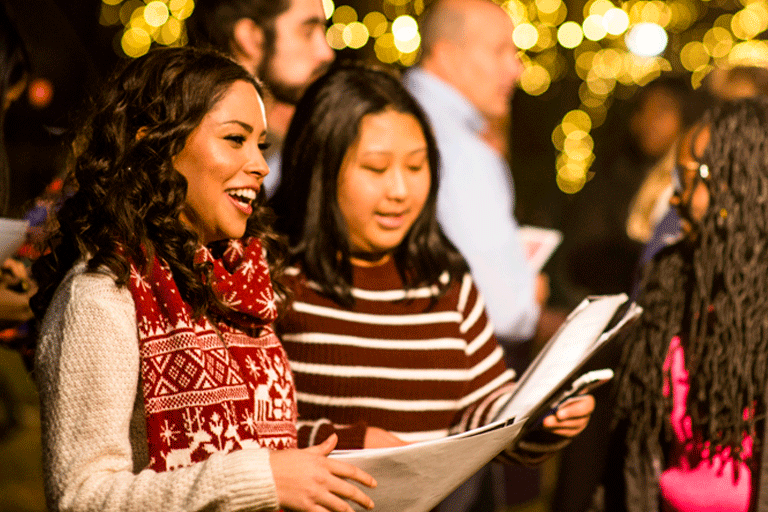 students sing during tree lighting
