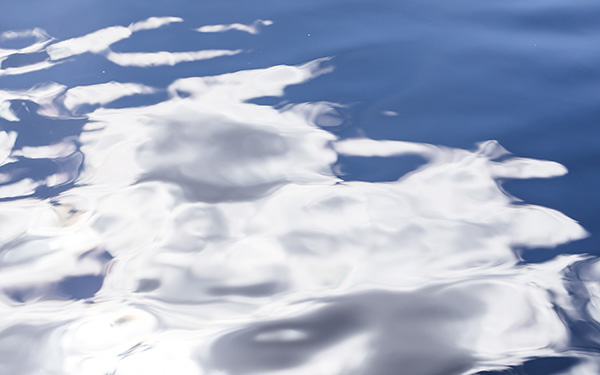 sky and clouds reflected in water