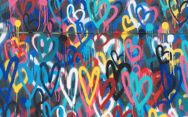 spray paint heart mural on wall
