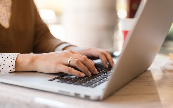 Student working at a cafe