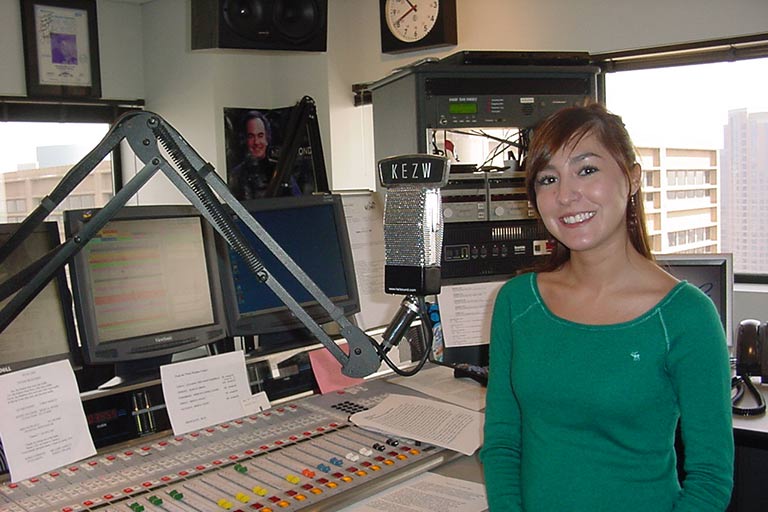 Regis UNiversity student intern at radio station 