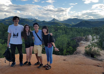 students take selfie in mountains