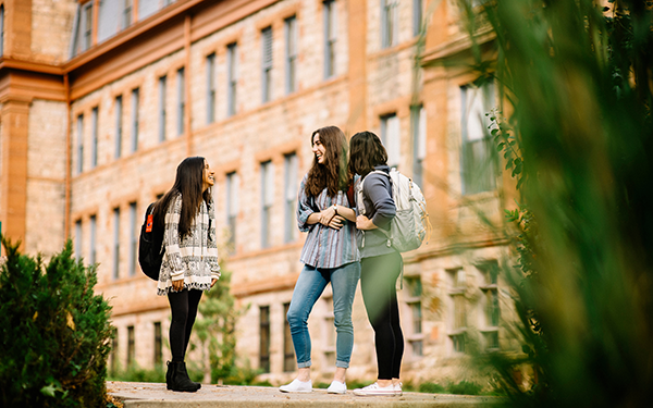 students talking by main hall