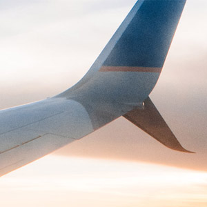 wing of plane in sky